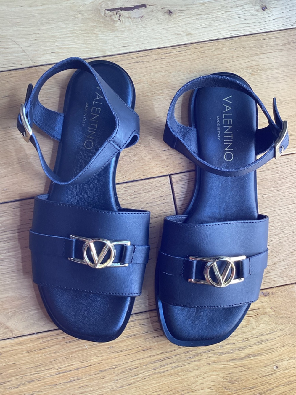 Valentino Cecillia Black Leather Ankle-Strap Sandals with Gold V Logo